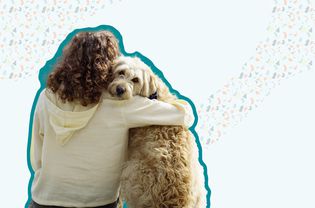 Person hugging dog